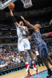 Charlotte Bobcats v New Orleans Hornets: David West and Boris Diaw