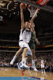 Milwaukee Bucks v Dallas Mavericks: Dirk Nowitzki and Andrew Bogut
