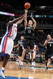 Detroit Pistons v Minnesota Timberwolves: Luke Ridnour and Jason Maxiell