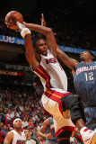 Charlotte Bobcats v Miami Heat: Chris Bosh and Tyrus Thomas