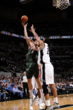 Milwaukee Bucks v San Antonio Spurs: Andrew Bogut and Tim Duncan