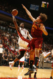 Cleveland Cavaliers v Miami Heat: Dwyane Wade and Anderson Varejao