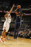 Denver Nuggets v Charlotte Bobcats: Carmelo Anthony and Boris Diaw