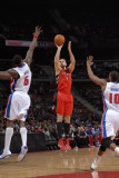 Toronto Raptors v Detroit Pistons: Linas Kleiza  Ben Wallace and Greg Monroe