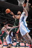 Milwaukee Bucks v Denver Nuggets: Corey Maggette and Chris Andersen