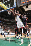 Miami Heat v Utah Jazz: Al Jefferson and Dwayne Wade