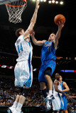 Dallas Mavericks v New Orleans Hornets: Jose Barea and Jason Smith