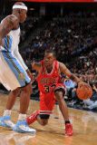 Chicago Bulls v Denver Nuggets: CJ Watson and Al Harrington