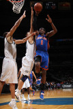 New York Knicks v Washington Wizards: Amar'e Stoudemire  Yi Jianlian and JaVale McGee