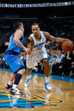 Dallas Mavericks v New Orleans Hornets: Jerryd Bayless and Jose Barea