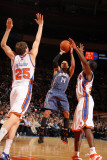 Charlotte Bobcats v New York Knicks: DJ Augustin  Timofey Mozgov and Toney Douglas