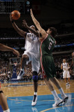 Milwaukee Bucks v Dallas Mavericks: Brendan Haywood and Andrew Bogut
