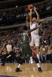 Milwaukee Bucks v Dallas Mavericks: Dirk Nowitzki and Larry Sanders