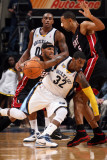 Miami Heat v Memphis Grizzlies: OJ Mayo  Juwan Howard and Eddie House