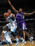 Sacramento Kings v New Orleans Hornets: Chris Paul and Luther Head