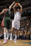Milwaukee Bucks v Dallas Mavericks: Dirk Nowitzki and Ersan Ilyasova