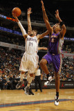 Phoenix Suns v Charlotte Bobcats: DJ Augustin and Channing Frye