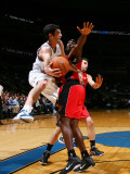 Toronto Raptors v Washington Wizards: Kirk Hinrich and Reggie Evans