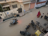 Women with Candles and Sparklers Visit Neighbors in Honor of Diwali