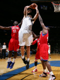 Philadelphia 76ers v Washington Wizards: JaVale McGee  Elton Brand and Jrue Holiday