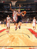 Atlanta Hawks v Toronto Raptors: Zaza Pachulia and Amir Johnson