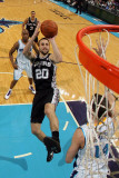 San Antonio Spurs v New Orleans Hornets: Manu Ginobili and Jason Smith