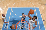 Minnesota Timberwolves v Denver Nuggets: Nene and Kevin Love