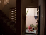 A Woman Prepares to Decorate for Diwali