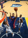Detroit Pistons v Memphis Grizzlies: Greg Monroe  Greivis Vasquez and Sam Young