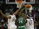 Boston Celtics v Charlotte Bobcats: Paul Pierce  Boris Diaw and Kwame Brown