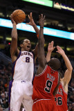 Chicago Bulls v Phoenix Suns: Channing Frye and Luol Deng