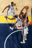 Detroit Pistons v Memphis Grizzlies: Greg Monroe  Darrell Arthur and Marc Gasol