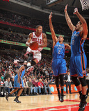 Oklahoma City Thunder v Chicago Bulls: Derrick Rose  Nenad Krstic and Thabo Sefolosha