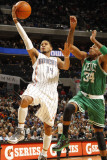 Boston Celtics v Charlotte Bobcats: Paul Pierce and DJ Augustin