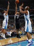San Antonio Spurs v New Orleans Hornets: Tony Parker and David West