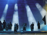 Performers in Celtic Dress on Stage During the Interceltique Festival