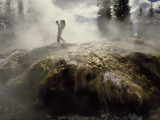 Venting Steam Veils a Hiker Skirting a Hot Spring in the Bechler Backcountry