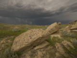 Thunderclouds Gather Above Eroded Buttes in the Grasslands