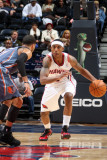 Charlotte Bobcats v Atlanta Hawks: Jeff Teague and DJ Augustin