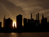 The Silhouetted Manhattan Skyline Seen from across the East River