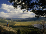 A Hiker Looks over the Teton Wilderness Area  Wyoming