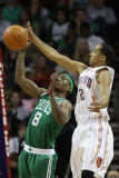 Boston Celtics v Charlotte Bobcats: Marquis Daniels and Shaun Livingston