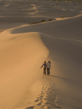 Teenagers Walk across Mesquite Dunes Near Stovepipe Wells