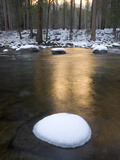 The Sun Reflects Off the River and Snow-Covered Rocks in Yosemite