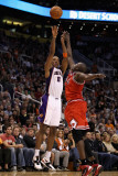 Chicago Bulls v Phoenix Suns: Channing Frye and Luol Deng