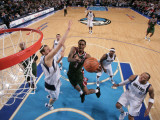 Milwaukee Bucks v Dallas Mavericks: Brandon Jennings and Dirk Nowitzki