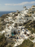 Stuccoed Houses and Windmills on a Hillside