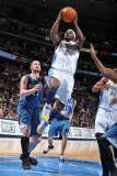 Minnesota Timberwolves v Denver Nuggets: Ty Lawson and Kevin Love