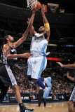 San Antonio Spurs v Denver Nuggets: Nene and Tim Duncan