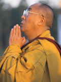 The Dalai Lama Prays During a Ceremony